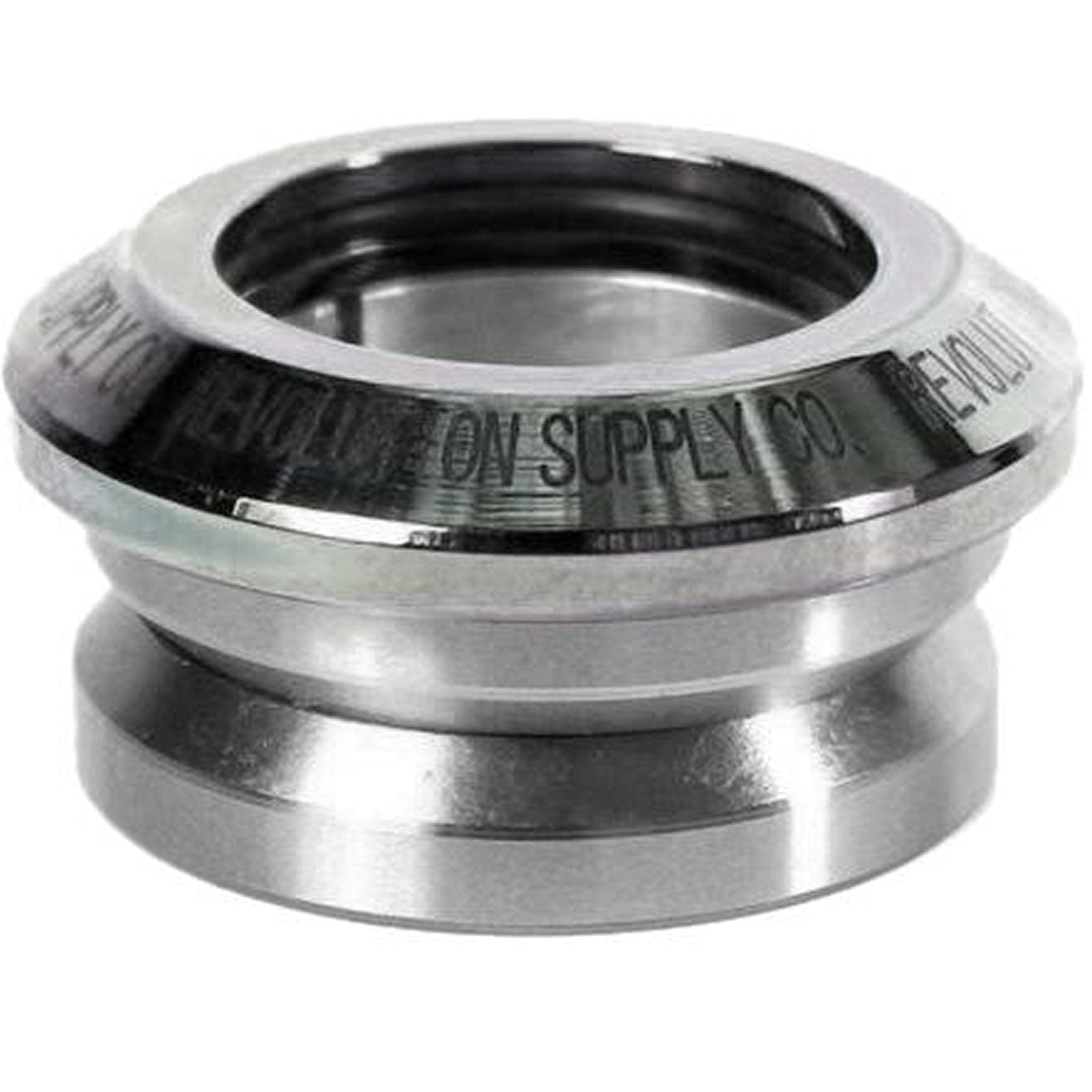A chrome ring from the Revolution Flow Integrated Stunt Scooter Headset, featuring smooth, polished surfaces and engraved text along the edge. It includes sealed bearings and its cylindrical design indicates its use as a mechanical or industrial component.