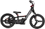 The Revvi 16" Plus Kids Electric Balance Bike - Black from Revvi features a sleek black frame with striking red accents and robust black tires. Its BMX-style handlebar pairs well with the compact electric motor, providing a contemporary and sporty appearance ideal for young riders looking to develop their skills on this outstanding balance bike.