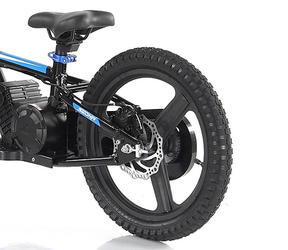 A close-up of the Revvi 16" Plus Kids Electric Balance Bike - Blue showcases its black and blue design, complete with a thick, treaded rear tire fitted with a disc brake. The frame displays visible wiring and houses a battery pack above the wheel. The seat is strategically placed above the rear end, making it an ideal choice for young riders.