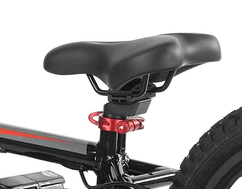 Close-up of a bicycle seat on a sleek black frame with a red clamp, reminiscent of the stylish Revvi 16" Plus Kids Electric Balance Bike in pink. The rear wheel is partially visible, and the seat's contoured design offers comfort similar to that of a balance bike.