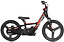 The Revvi 16" Plus Kids Electric Balance Bike - Red is a stylish black and red children's bike with thick tires, ideal for young riders. With its minimalist design, the balance bike showcases a simple seat and compact motor positioned near the pedals, all set against a plain white background.