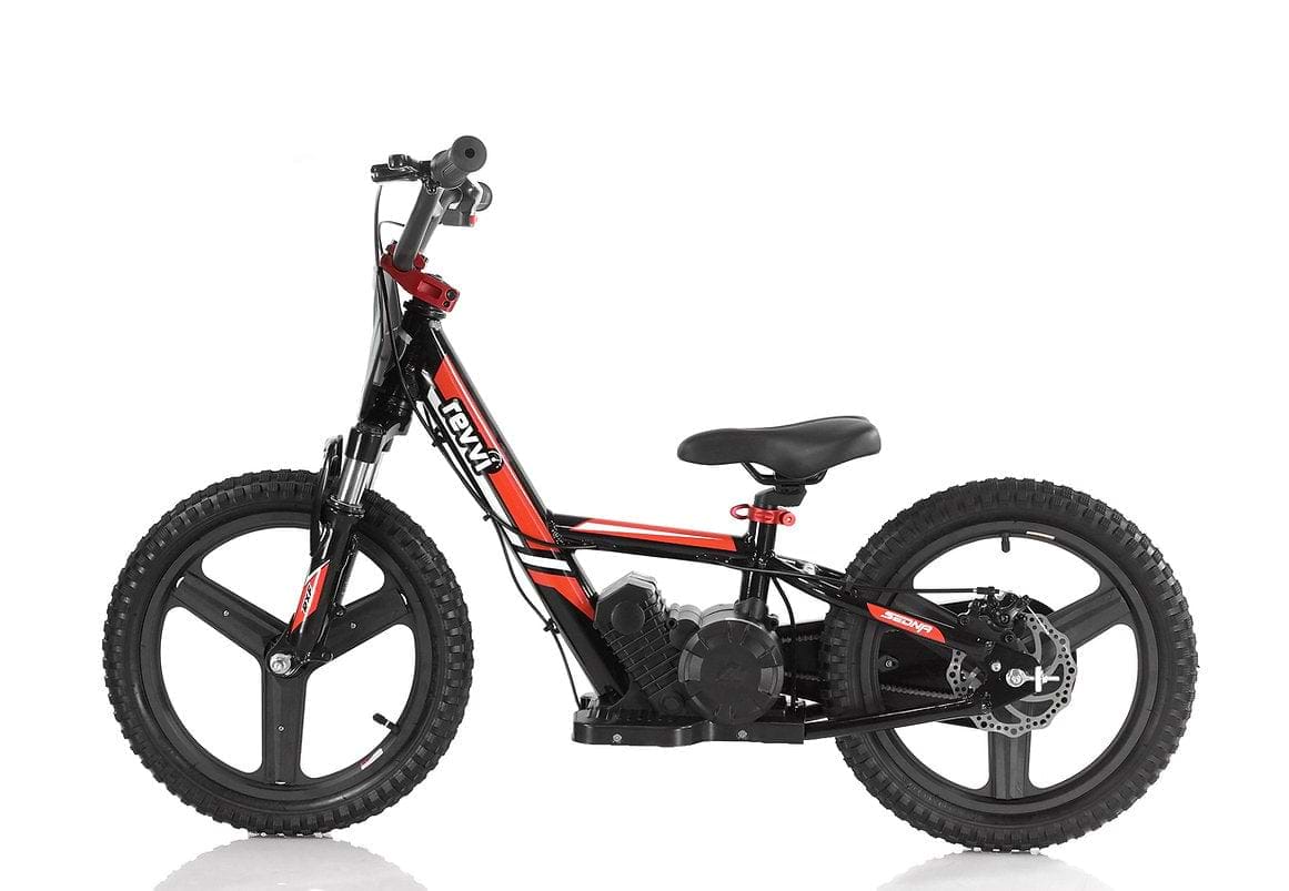 Introducing the Revvi 16" Plus Kids Electric Balance Bike in red, a kid-friendly electric bike. It boasts a sleek frame with eye-catching red accents, wide tires for stability, and a comfortable seat for young riders. The straight handlebars enhance control, while the battery is discreetly integrated into the frame against a simple white background.