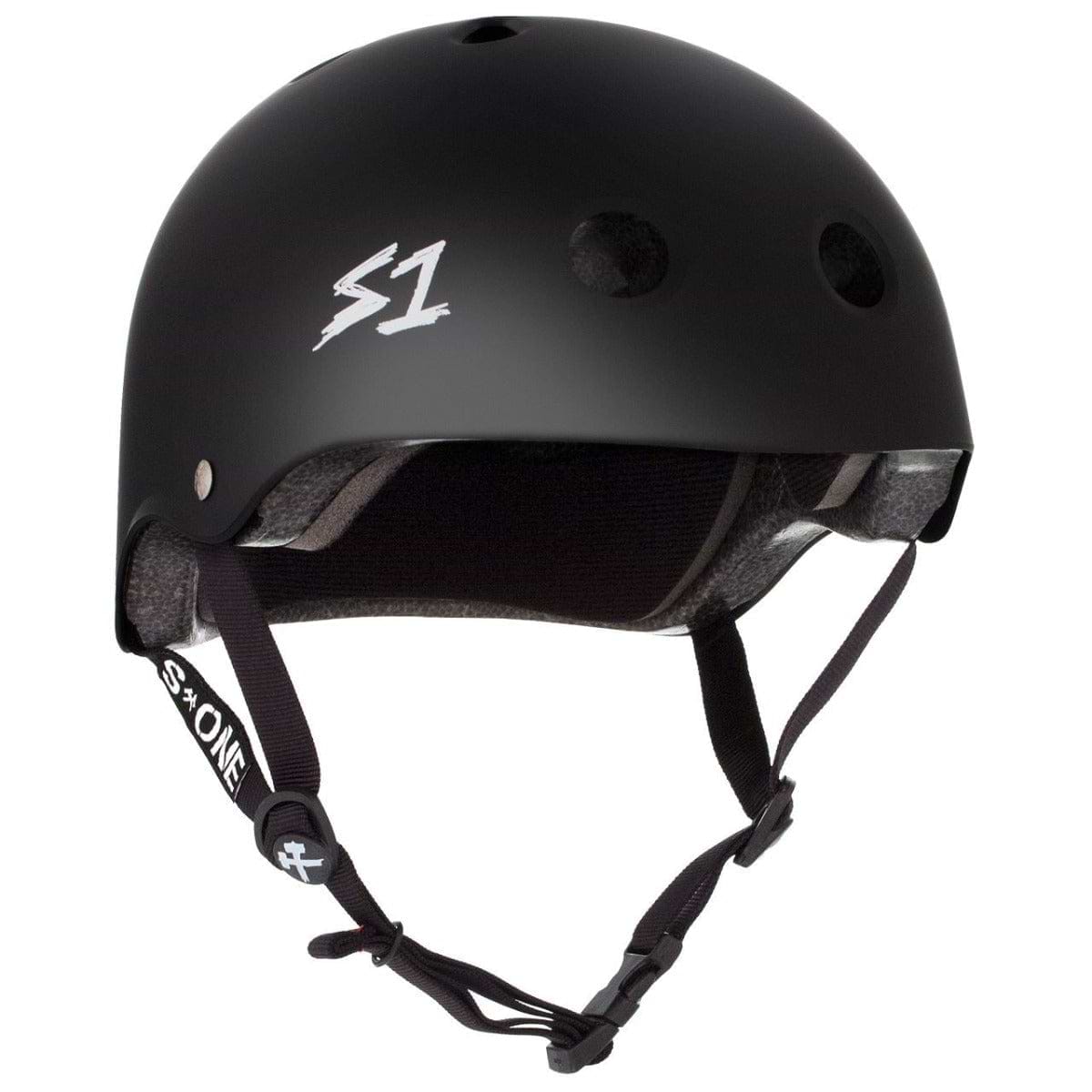 The S1 Lifer Skate / Scooter Helmet - Matt Black, crafted by S1, features a stylish matte black design with multiple ventilation holes and an adjustable chin strap. It is enhanced with EPS Fusion Foam for superior safety and prominently displays the white "S1" logo on the side.