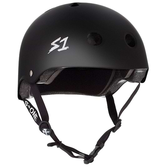 The S1 Lifer Skate / Scooter Helmet - Matt Black, crafted by S1, features a stylish matte black design with multiple ventilation holes and an adjustable chin strap. It is enhanced with EPS Fusion Foam for superior safety and prominently displays the white "S1" logo on the side.