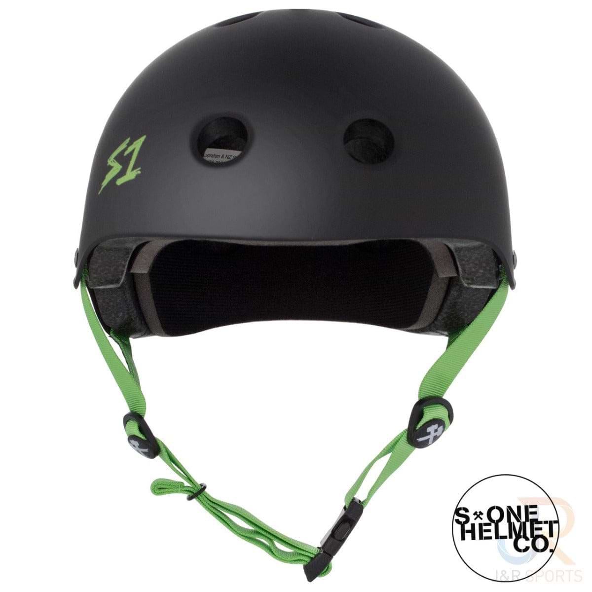 The S1 Lifer Skate/Scooter Helmet in Matt Black with Green straps features a graphic logo on the front. It offers a simple design with top ventilation holes and uses EPS Fusion Foam to enhance safety. The S1 branding is prominently displayed inside a circle at the bottom of the helmet.