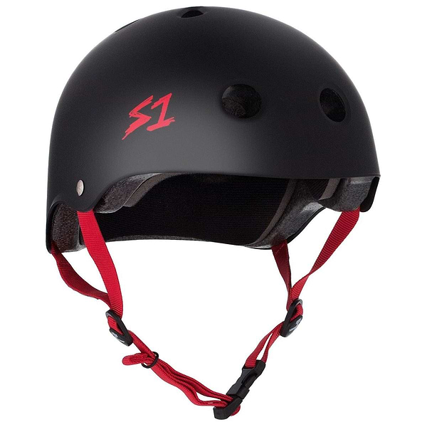The S1 Lifer Skate / Scooter Helmet by S1 showcases a matte black finish with ventilation holes and red adjustable straps. Its sturdy shell is bolstered by EPS Fusion Foam, and the recognizable red "S1" logo is prominently visible on the side.