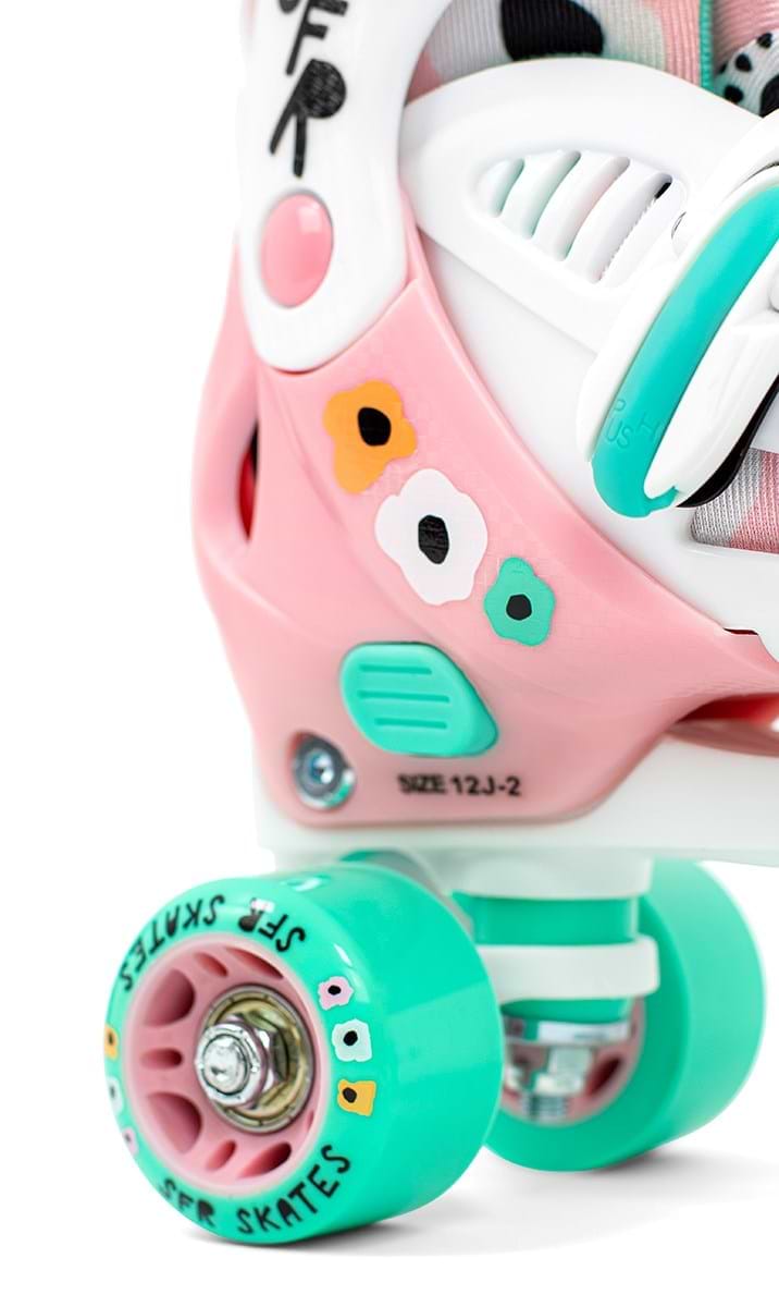 Close-up of the vivid SFR Storm V Adjustable Quad Roller Skates - Flower, showcasing pastel teal wheels and a white-and-pink boot. The boot, which is size-adjustable from "12J-2," is adorned with small, cheerful floral designs. The "SFR Skates" branding is visible on the heel and wheel, making it an ideal choice for young roller skating enthusiasts.