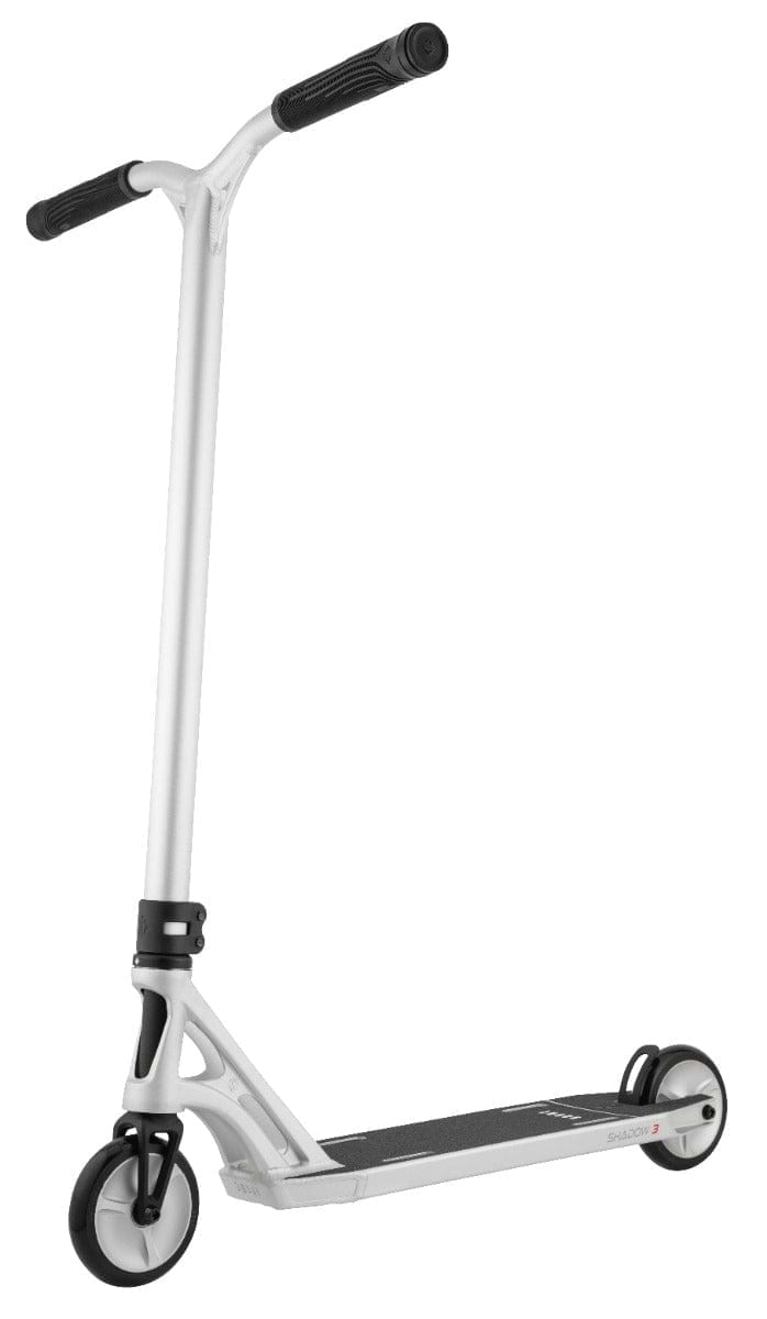The Drone Shadow 3 Feather-Light Complete Stunt Scooter in Silver Anodized boasts a sleek design with black handlebars and deck. Featuring Helios Hollow-Spoked Wheels, this minimalist ride offers effortless gliding on its two inline wheels.