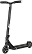 The CORE SL3 Mini Complete Stunt Scooter in black features a textured deck, two small wheels, and a T-shaped handlebar, making it ideal for use as a park or stunt scooter. The product is displayed against a white background.