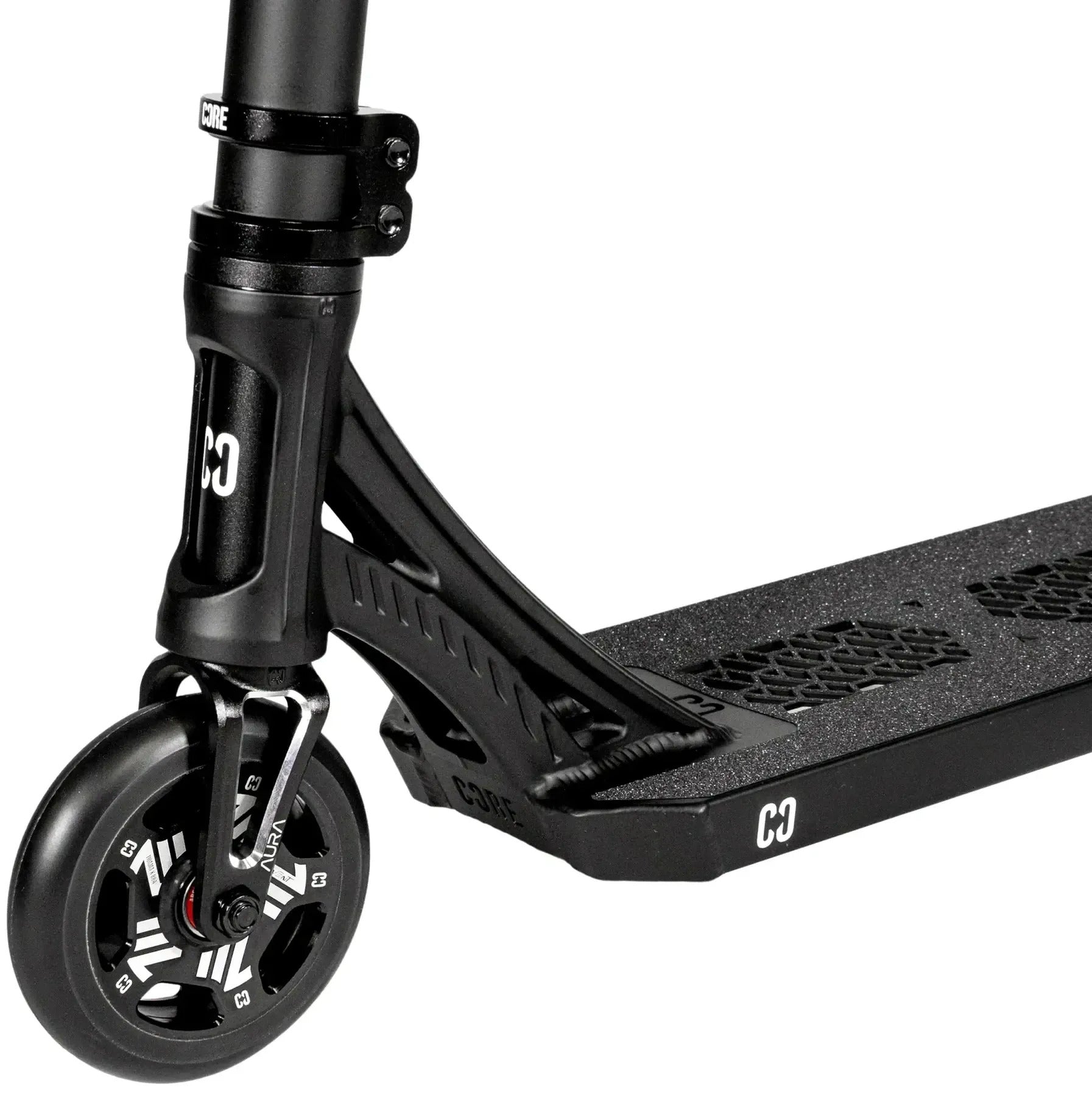 Close-up of the CORE SL3 Mini Complete Stunt Scooter in black, highlighting the front wheel, fork, and a section of the deck with textured grip tape featuring “C3” branding—an ideal mini complete scooter designed for park scooter enthusiasts by CORE.