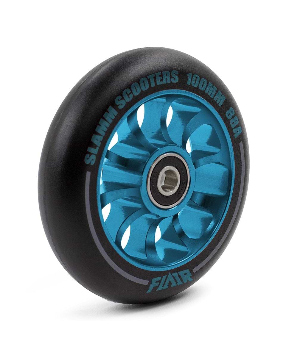 Introducing the Slamm Flair 2.0 100mm Stunt Scooter Wheel in Blue, this stylish wheel features a sleek blue and black design with "SLAMM SCOOTERS 100MM 88A" along the edge and "FLAIR" prominently on the body. It boasts a metallic blue core and comes equipped with ABEC-9 bearings for an exceptionally smooth ride, making it perfect for stunt scooter enthusiasts.