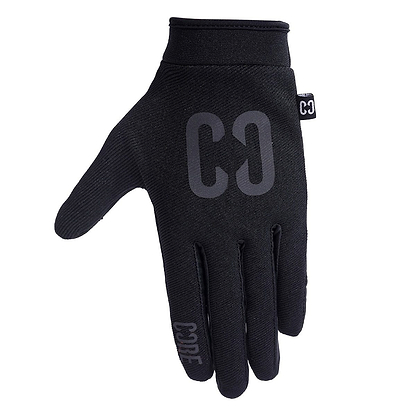 The CORE Aero Skate Protection Gloves in Stealth Black are sleek gloves that feature "CODE" on the index finger and "CØ" on the back. Made from smooth, fitted material, they boast a grip-enhancing design ideal for riding enthusiasts. They also include a small tag on the side and are touch screen friendly for convenient device use.
