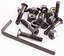 A set of Sushi Skateboard Allen Truck Bolts - 1" Black featuring a black hex bolt design, Nyloc nuts, and an L-shaped hex key on a white background. The hardware pieces are arranged neatly to highlight their metallic finish and diverse sizes, making them ideal for projects that demand secure fastening with a sleek appearance.