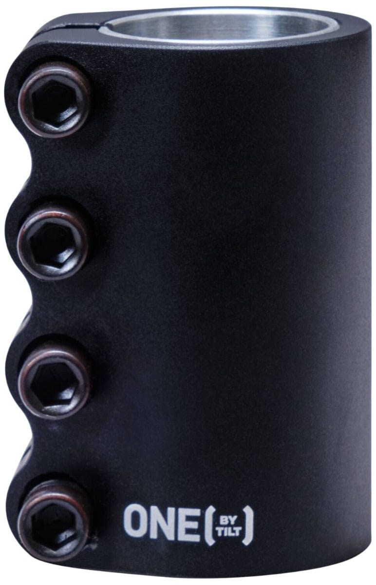 Introducing the Tilt Stage 1 Pro 4 Bolt SCS Stunt Scooter Clamp in a sleek black metal finish, showcasing four hex bolts on the side and engraved with "ONE BY TILT" at the bottom—a perfect addition for customizing your setup.