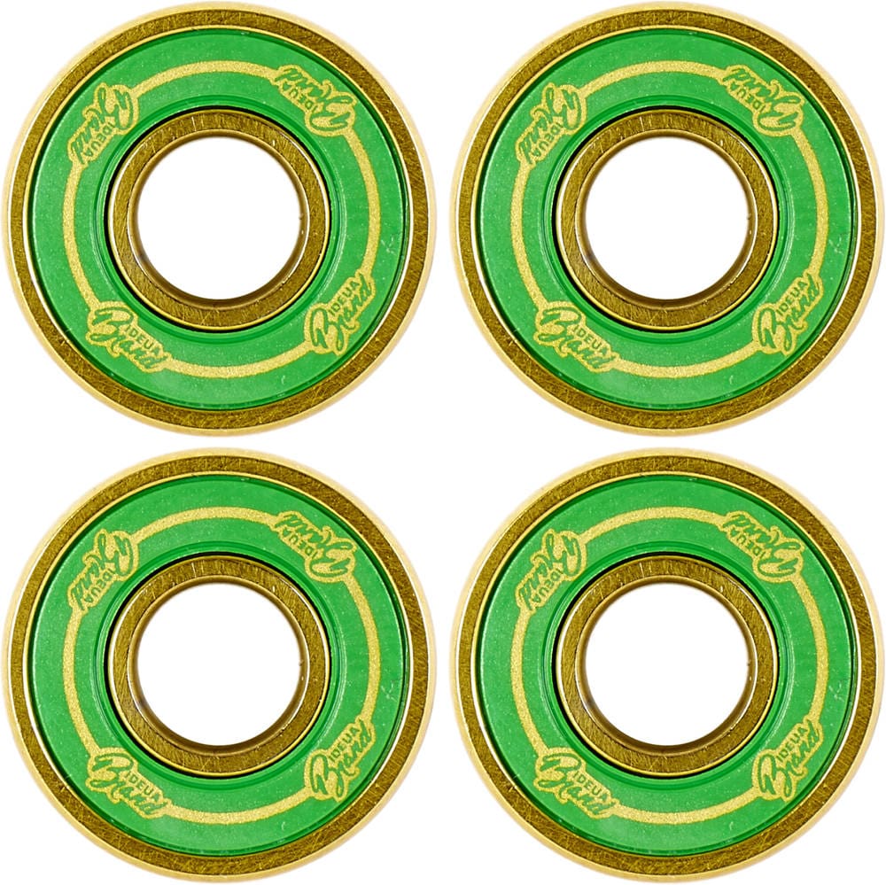 The UrbanArtt 8STD Scooter Bearings - 4 Pack, featuring green and gold accents with decorative text and concentric colored rings, are arranged in a square pattern on a white background. Designed by UrbanArtt for enhanced scooter speed, these bearings are suitable for an 8mm axle.
