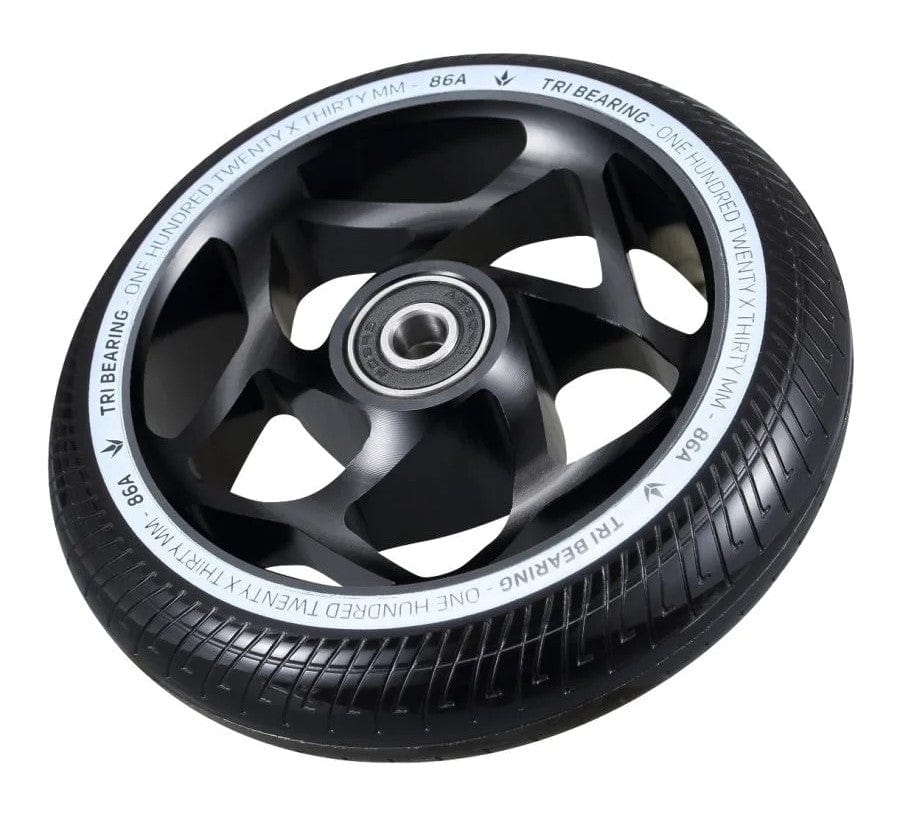 A Blunt Envy scooter wheel in black, featuring a Tri-Bearing design with a 120mm diameter and 30mm width. The center includes a silver bearing, while the outer edge displays "TRI BEARING ONE HUNDRED TWENTY x THIRTY MM 86A." Its unique design with multiple cutouts enhances control and provides a modern aesthetic.