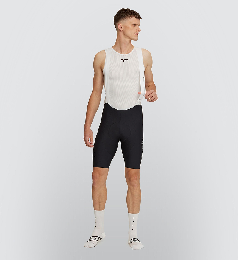 Essentials Men's SuperFIT 2.0 Bib Short Black - Experience unparalleled comfort with SuperFIT 2.0 Cycling Bib Shorts, Pedla's most cherished bib shorts now upgraded, elevated by an advanced brace system for superior support and ventilation. Constructed from the finest Italian fabric, this bib is meticulously engineered to provide optimal muscle support and stability.