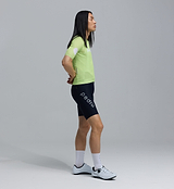 Men's Air Jersey in Glow lime-green, side view on model, short-sleeve cycling jersey with breathable mesh panels, moisture-wicking fabric, UPF 15+, lightweight summer performance fit and low-profile rear pockets