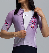 Close-up mauve-fade dots men's Classic Cycling Jersey (LunaLUXE) — performance road cycling jersey, breathable SPF50 moisture-wicking fabric, four-way stretch, ventilation panels, extended sleeves, low-cut collar, silicone hem gripper
