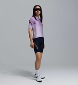 Men's LunaLUXE Classic mauve-fade dot print cycling jersey, side view — performance road jersey with SPF50 breathable moisture-wicking fabric, four-way stretch, ventilation panels, extended sleeves and silicone hem gripper