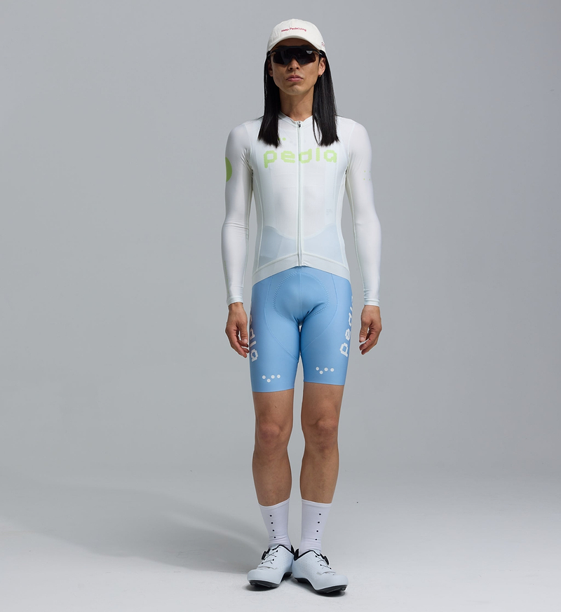 Men's Dots Classic long-sleeve cycling jersey in Porcelain Glow, breathable SPF50 moisture-wicking four-way stretch with side ventilation panels, form-fitting race fit and soft silicone hem gripper (front view)