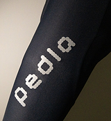 Dots Men's SuperFIT 2.0 Bib Short Black - Experience unparalleled comfort with SuperFIT 2.0 Cycling Bib Shorts, Pedla's most cherished bib shorts now upgraded, elevated by an advanced brace system for superior support and ventilation. Constructed from the finest Italian fabric, this bib is meticulously engineered to provide optimal muscle support and stability.