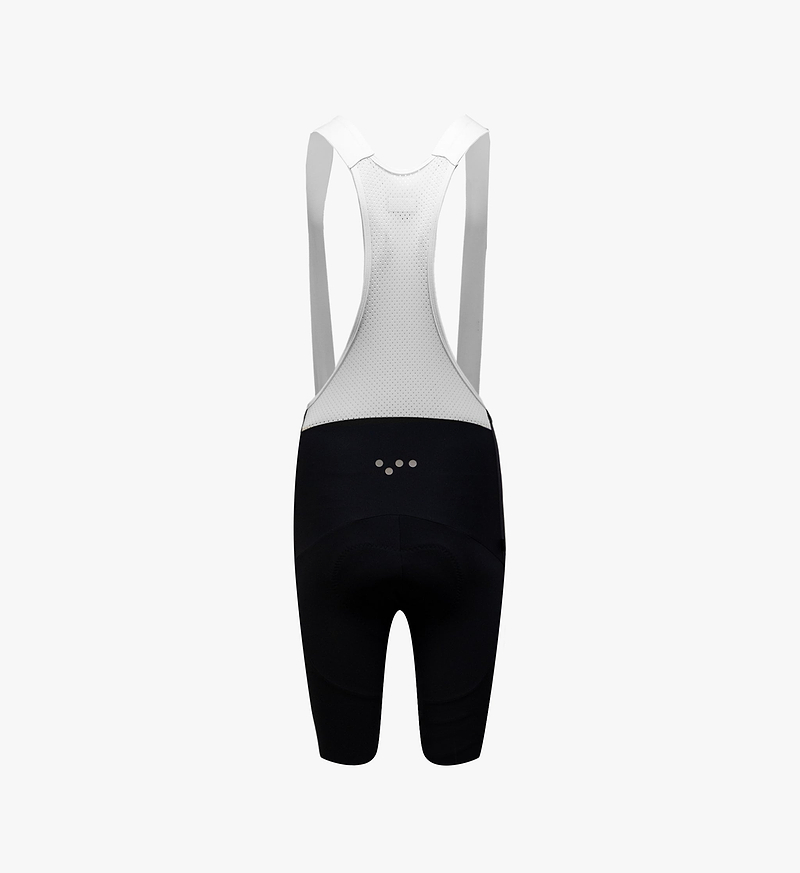Dots Men's SuperFIT 2.0 Bib Short Black - Experience unparalleled comfort with SuperFIT 2.0 Cycling Bib Shorts, Pedla's most cherished bib shorts now upgraded, elevated by an advanced brace system for superior support and ventilation. Constructed from the finest Italian fabric, this bib is meticulously engineered to provide optimal muscle support and stability.