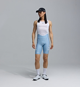Pedla SuperFIT 2.0 men's powder blue cycling bib shorts front view, white bib straps, Elastic Interface chamois, Italian performance fabric, aerodynamic fit, seamless cuffs, reflective logos