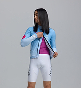 Close-up of men's blue gradient dots thermal long-sleeve cycling jersey with Chillblock fleeced interior, moisture-wicking knit, reflective logos, UPF 50+, two-way SAB zipper, hem gripper and zip pocket