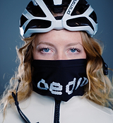 Black Roubaix neck gaiter with reflective Pedla dot print, high-visibility Miti Roubaix brushed-fleece cycling face and neck warmer, breathable thermal protection for winter rides