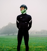 Green Roubaix thermal neck gaiter with Miti brushed fleece, reflective Pedla dots, high-visibility breathable cycling neck warmer/face buffer for cold-weather riding, helmet-compatible