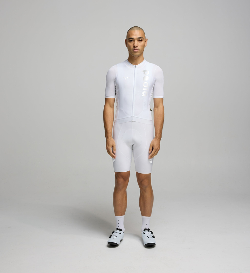 Dots Men's SuperFIT 2.0 Bib Short Reflective White - **The White SuperFIT bib shorts fit slightly larger than our standard SuperFIT sizing. If you are between sizes, we recommend sizing down.** Experience unparalleled comfort with SuperFIT 2.0 Cycling Bib Shorts, Pedla's most cherished bib shorts now upgraded, elevated by an advanced brace system for superior support and ventilation.