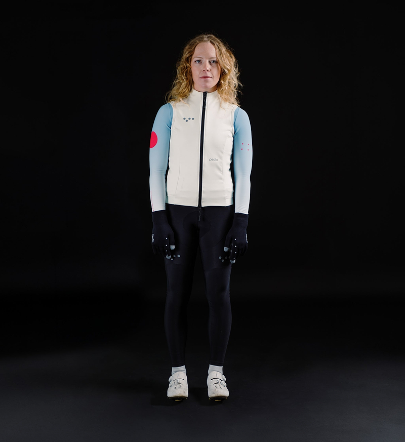 Women's porcelain thermal cycling gilet, front view — windproof, waterproof insulated thermal-knit cycling vest with SAB two-way waterproof zip, reflective chest and shoulder details, hem gripper and concealed rear zip pocket for storage