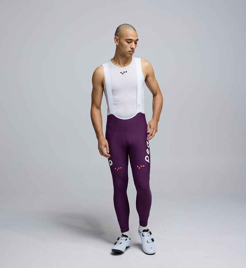 Front view of Pedla’s Men’s SuperFIT 2.0 Bib Tight in Aubergine showcasing sleek aerodynamic fit and high-performance construction