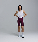 Pedla SuperFIT 2.0 men's cycling bib shorts in fig (maroon) with white mesh straps, Italian performance fabric, Elastic Interface chamois, aerodynamic fit, seamless cuff and reflective logos