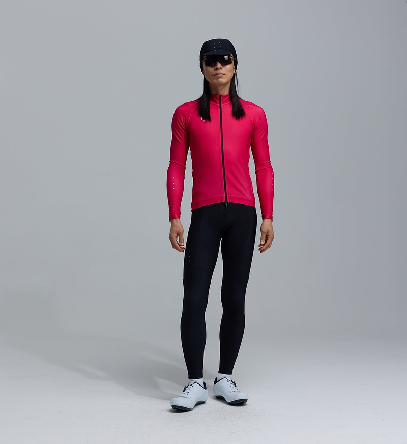 Men's fuchsia thermal long-sleeve cycling jersey, Chillblock fleece interior, SAB two-way zip, reflective details, UPF 50+, hem gripper, secure zip side pocket, three rear pockets, moisture-wicking breathable winter cycling jersey