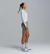 Women's Essentials Long Sleeve Classic cycling jersey (porcelain) side view — form-fitting performance road bike top with SPF50 breathable moisture-wicking fabric, four-way stretch, side ventilation panels and silicone gripper hem