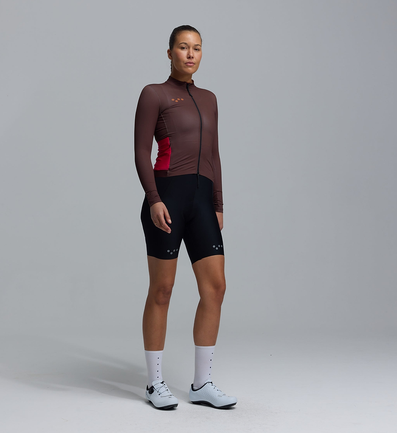 Women's midweight long-sleeve cycling jersey, wood brown, breathable moisture-wicking fabric with brushed thermal interior, articulated sleeves, hem gripper, four rear pockets and SAB two-way zipper for cool-weather layering