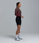 Women's midweight long-sleeve cycling jersey (wood) — side view; thermal brushed interior, breathable moisture-wicking fabric, articulated sleeves, hem gripper, four rear pockets, two-way zipper for cool-weather rides