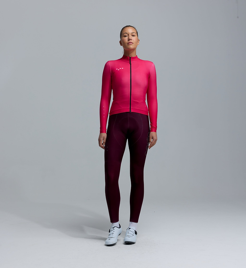 Pedla Women's SuperFIT 2.0 full-length cycling bib tights in fig with Elastic Interface chamois, premium Italian fabric, advanced brace support, aerodynamic compression and reflective logos for long-ride comfort and muscle stability