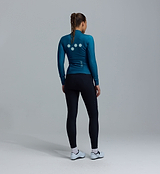 Pedla Essentials BOLD women's thermal long-sleeve cycling jersey, teal back, Chillblock thermal-fleece, moisture-wicking, reflective logos, UPF 50+, articulated sleeves, hem gripper, 3 rear pockets