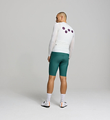 Rear view of porcelain Air Jersey – minimal back pocket design with reinforced seams, breathable mesh back panel, and reflective logo for functional summer cycling performance.