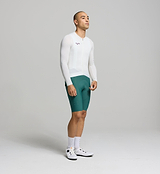Side profile of porcelain men’s long sleeve cycling jersey – performance fit with technical mesh fabric zones for temperature regulation and comfort on summer climbs.