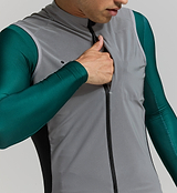 Detailed view of RideFLASH Gilet fabric texture and reflective outer shell; premium waterproof and windproof design.