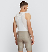 Essentials Men's SuperFIT 2.0 Bib Short Pumice - Experience unparalleled comfort with SuperFIT 2.0 Cycling Bib Shorts, Pedla's most cherished bib shorts now upgraded, elevated by an advanced brace system for superior support and ventilation. Constructed from the finest Italian fabric, this bib is meticulously engineered to provide optimal muscle support and stability.