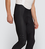 Black Essentials Men's SuperFit 2.0 Cycling Bib Tight displayed on male model, crafted from premium Italian fabric for optimal muscle support and aerodynamic performance. Close up.