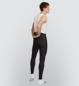 Rear angle of the Black Men's SuperFLEECE 2.0 Cycling Bib Tights, illustrating the perforated back panel for enhanced breathability and Elastic Interface chamois for long-lasting comfort.