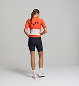 Back view of amber Classic Cycling Jersey – sculpted rear design with discreet back pockets, breathable materials, and silicone hem gripper for stay-put performance.