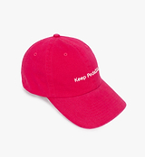 Fuchsia Pedla unisex peached cotton-twill cap — casual unstructured 6-panel cycling hat with curved visor, adjustable buckle closure and subtle embroidered "Keep Pedalling" logo