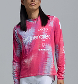 Close-up of Frequencies unisex long-sleeve cycling tech tee in fuchsia tie-dye with Frequencies and Trek logos — ultralight breathable Italian knit, UPF 50+, flatlock seams and hydration-tube channel, gravel/endurance/adventure-ready.